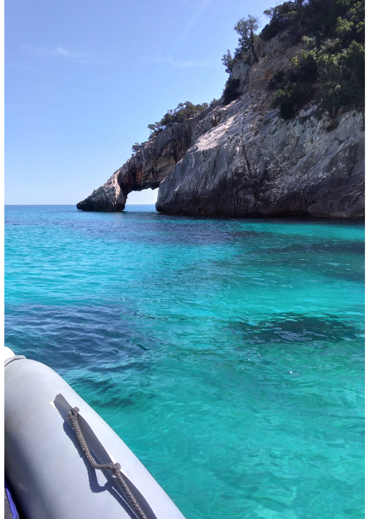 Limestone cliffs and turquoise Mediterranean water along the Gulf of Orosei in eastern Sardinia