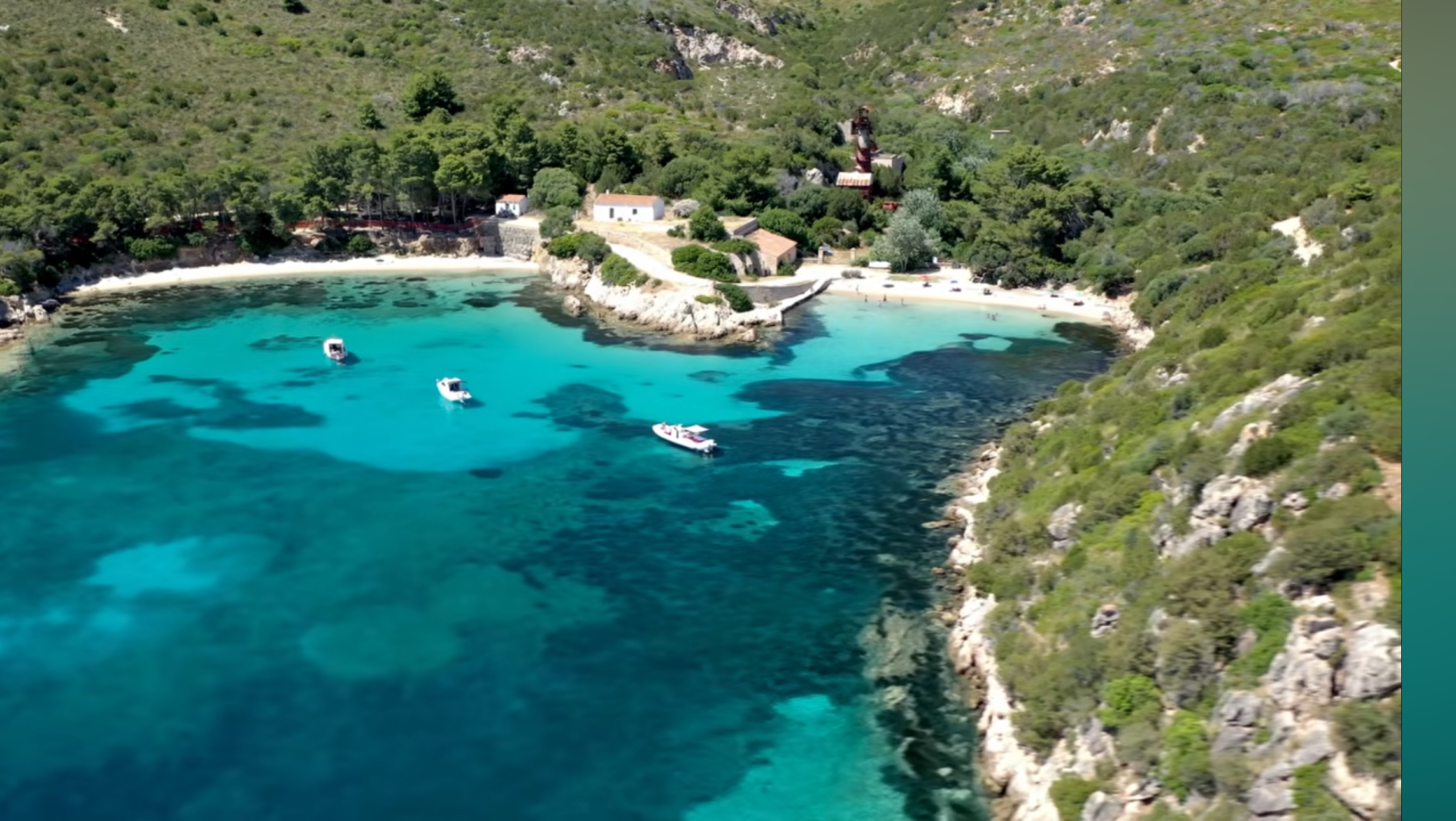Aerial view of Cala Moresca's two sheltered coves and turquoise water near Golfo Aranci