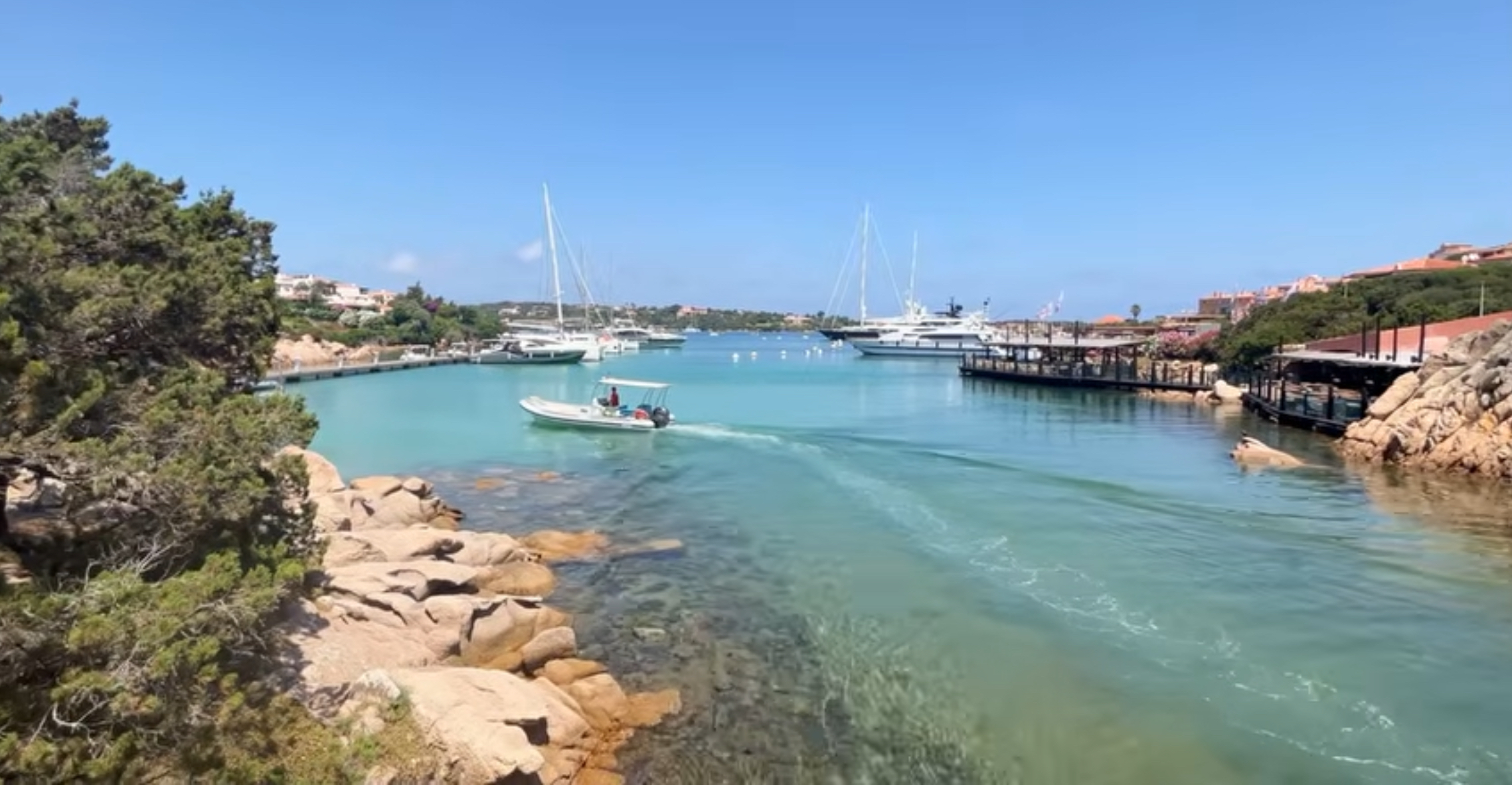 Porto Cervo marina with yachts and waterfront walkways