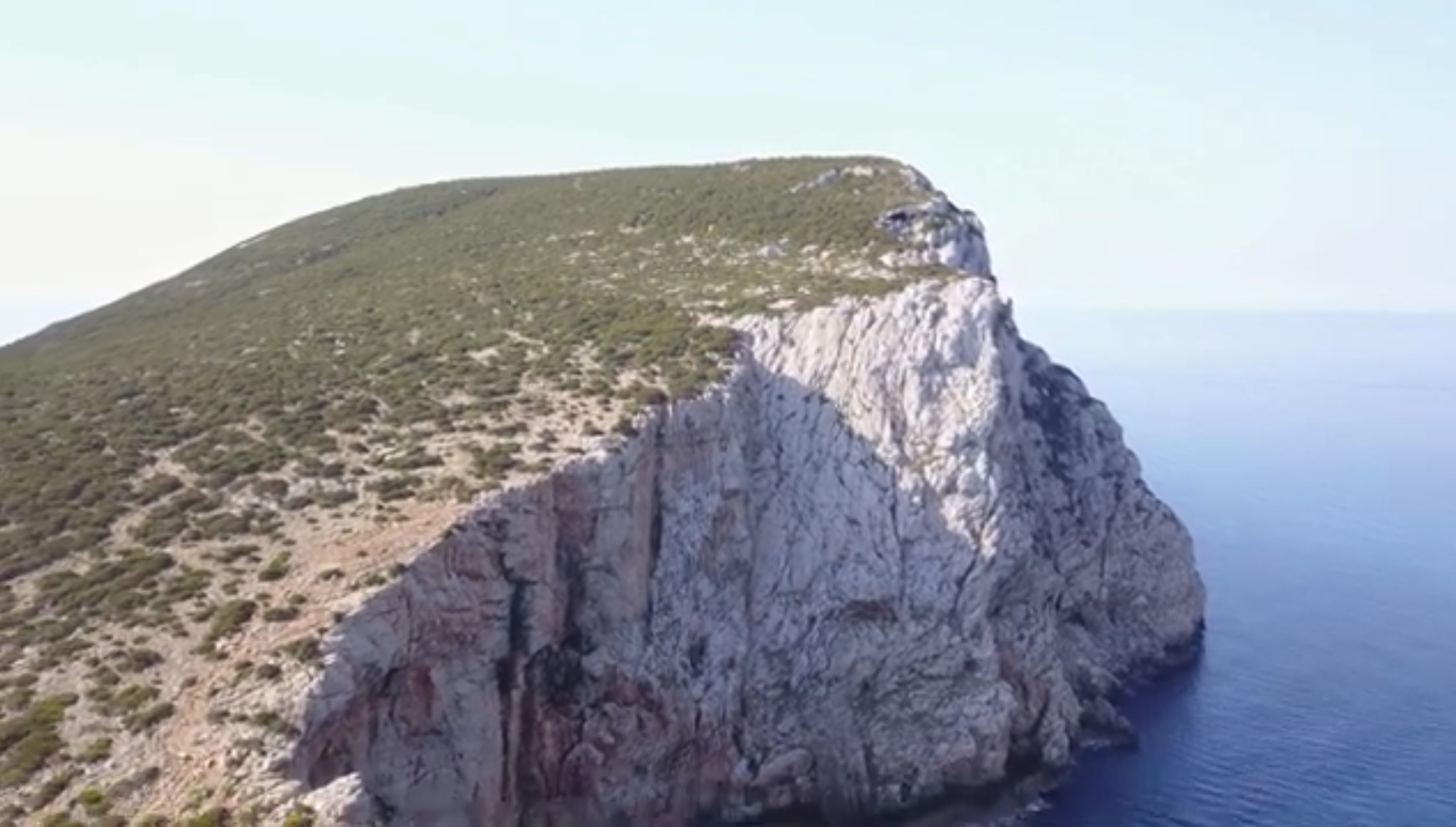 Dramatic limestone cliffs at Capo Caccia near Alghero in northwest Sardinia